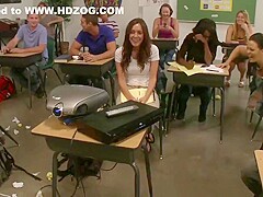 Wavy hair babe bends over and takes it from the back in the classroom