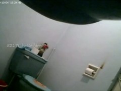 Pissing girls are filmed in the bathroom