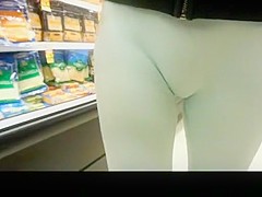 Woman in tight white panties at the supermarket