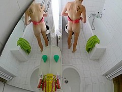 Hot brunette chick with tattoos showering