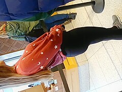 Candid teen in leggings ice cream shopping