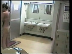 Fresh after shower nude girl shows tan lines on spy cam