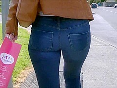 Candid ass in tight jeans tan leather jacket