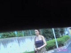 Sexy Asian with a thong got her skirt sharked while walking