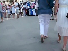 Cute girl in a white summer dress